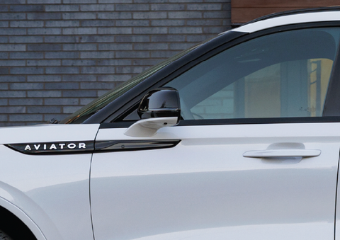 The driver’s door of a white 2025 Lincoln Aviator® SUV is showcased. | Steet-Ponte Lincoln in Yorkville NY