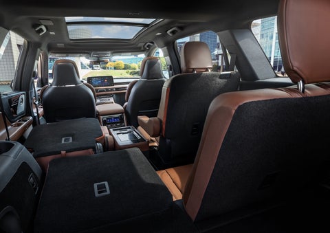 The interior of the 2025 Lincoln Aviator® SUV is shown with two seats folded down for added space. | Steet-Ponte Lincoln in Yorkville NY
