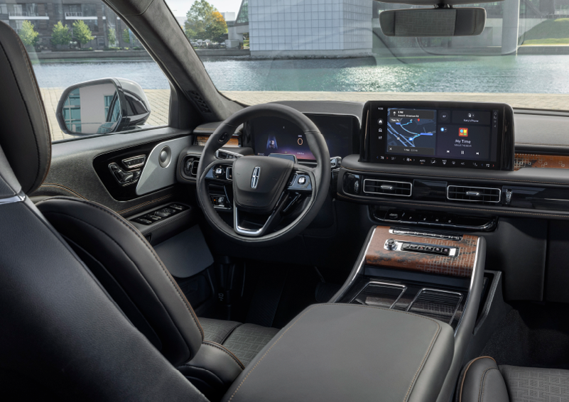 The interior of the 2025 Lincoln Aviator® SUV is shown parked with a view of a harbor through the windshield. | Steet-Ponte Lincoln in Yorkville NY
