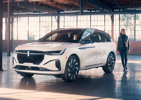 A person approaches a 2025 Lincoln Nautilus® SUV. | Steet-Ponte Lincoln in Yorkville NY