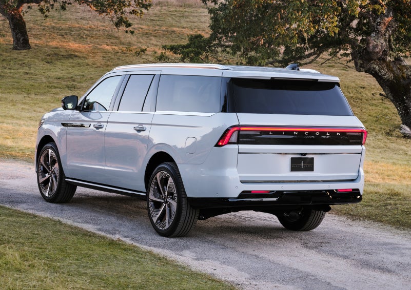 The wraparound rear lights of a Lincoln Navigator® SUV are shown.