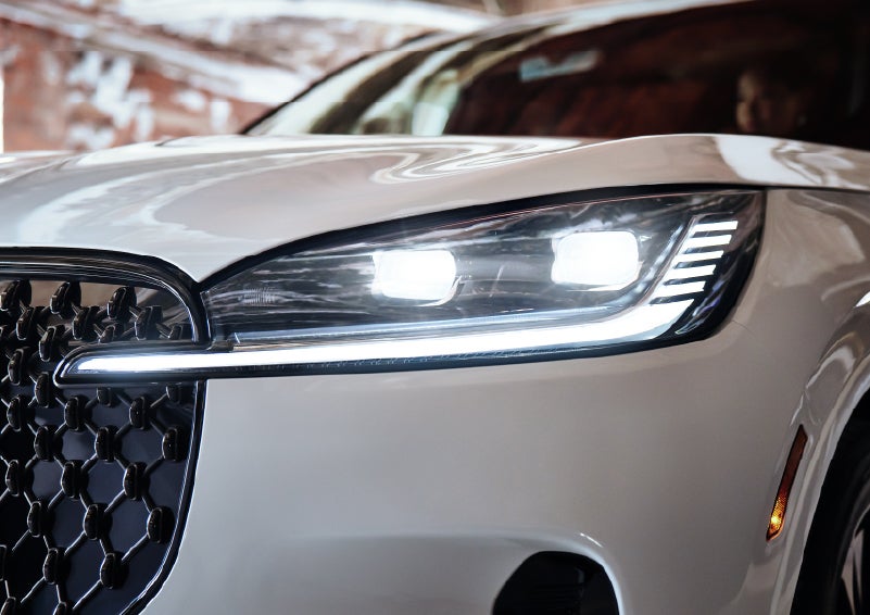 A close-up of a headlamp on the 2026 Lincoln Aviator® SUV is shown. | Steet-Ponte Lincoln in Yorkville NY