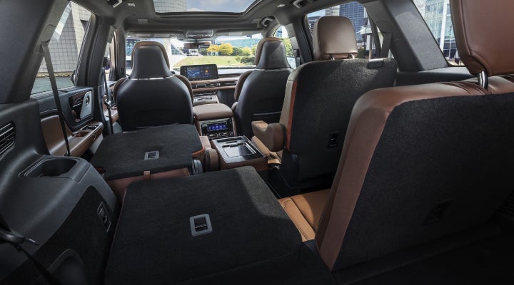 One side of the PowerFold® third-row seat and a second-row seat are folded forward in the 2026 Lincoln Aviator® SUV. | Steet-Ponte Lincoln in Yorkville NY