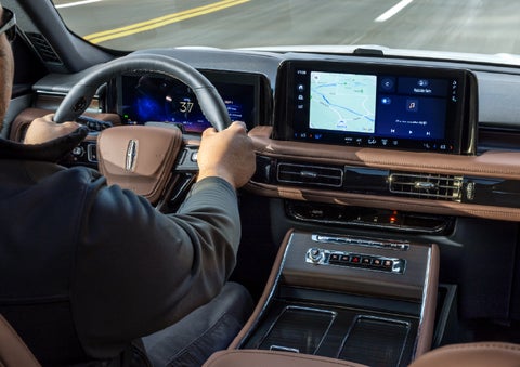 A person is driving a 2026 Lincoln Aviator® SUV as seen from inside the cabin. | Steet-Ponte Lincoln in Yorkville NY