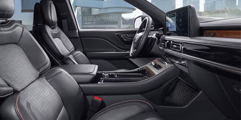 interior side view of driver and passenger driving consoles in a 2025 Lincoln Aviator