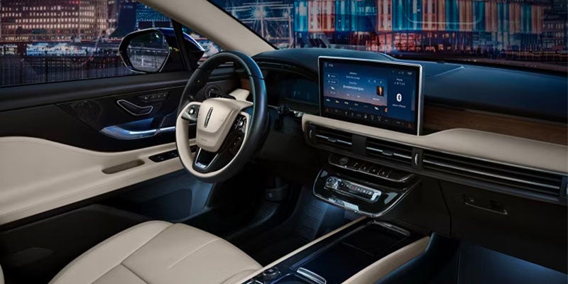 interior view of drivers side with airbag in steering wheel